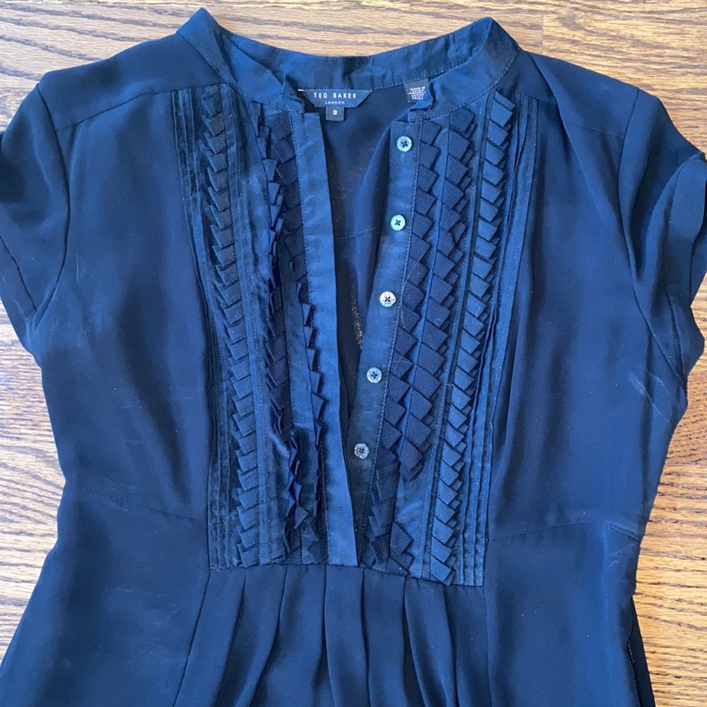 Simply stunning Ted Baker cap sleeve flowy gossamer like black dress. Size 2